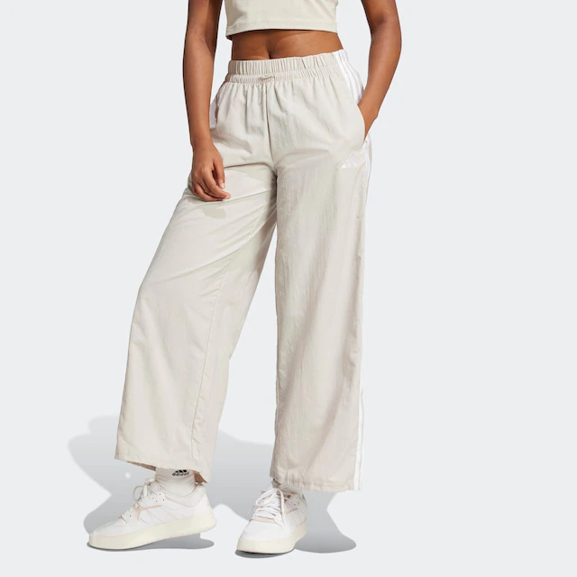 adidas Sportswear Sporthose »ESSENTIALS 3-STREIFEN LIFESTYLE WOVEN PARACHUTE« Fallschirmhose, locker geschnitten, mit weitem Bein