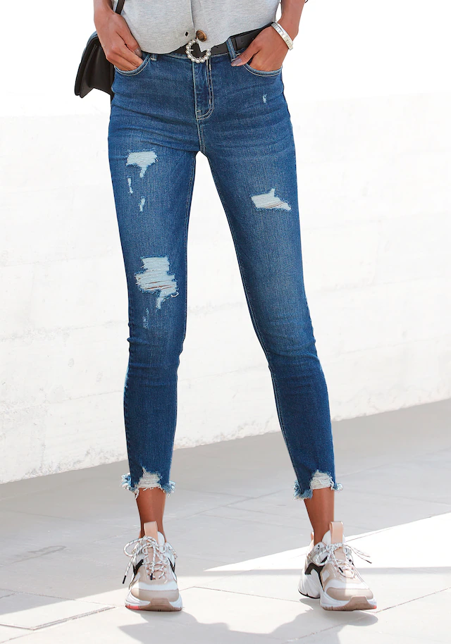 Buffalo Destroyed-Jeans »mit ausgefransten Saumabschlüssen aus bequemer Baumwollmischung« mit ausgefranstem Beinabschluss und Stretchanteil, schmale Passform