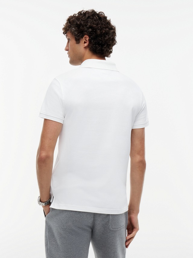 Tommy Hilfiger Poloshirt »1985 SLIM POLO« mit Stickerei, Piqué-Qualität, Slim fit