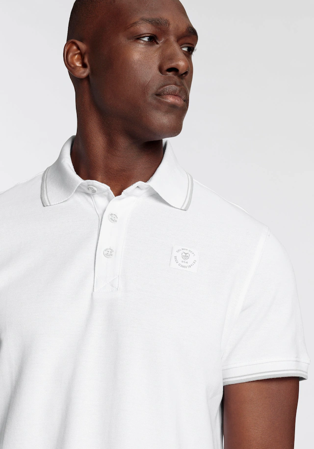 DELMAO Poloshirt »in vielen Sommer Farben! Preis-Leistungs Bestseller!« Trendige lockere Passform, immer perfekt gestylt! Sportlicher Look