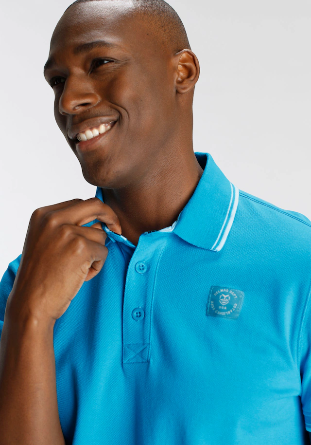 DELMAO Poloshirt »in vielen Sommer Farben! Preis-Leistungs Bestseller!« Trendige lockere Passform, immer perfekt gestylt! Sportlicher Look