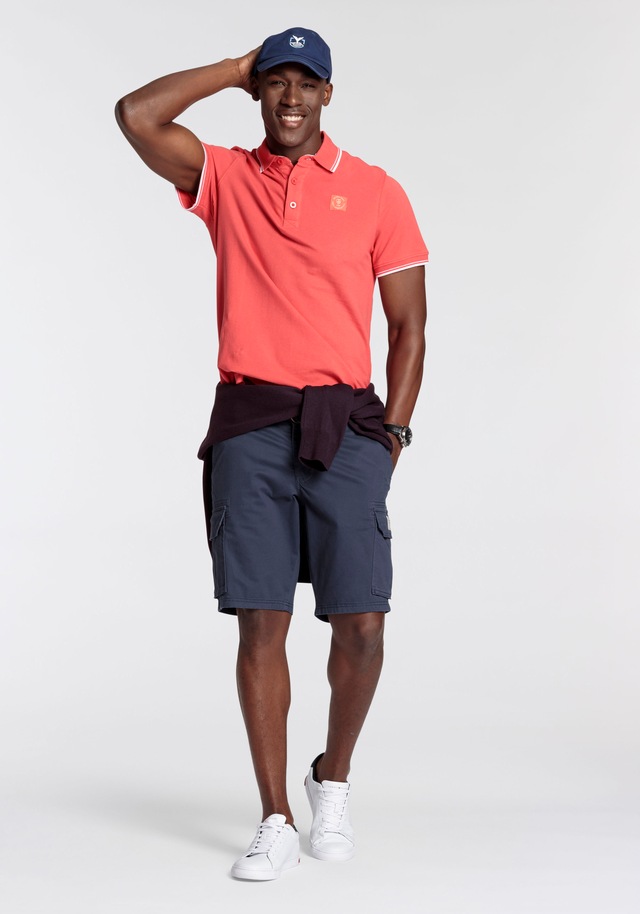 DELMAO Poloshirt »in vielen Sommer Farben! Preis-Leistungs Bestseller!« Trendige lockere Passform, immer perfekt gestylt! Sportlicher Look