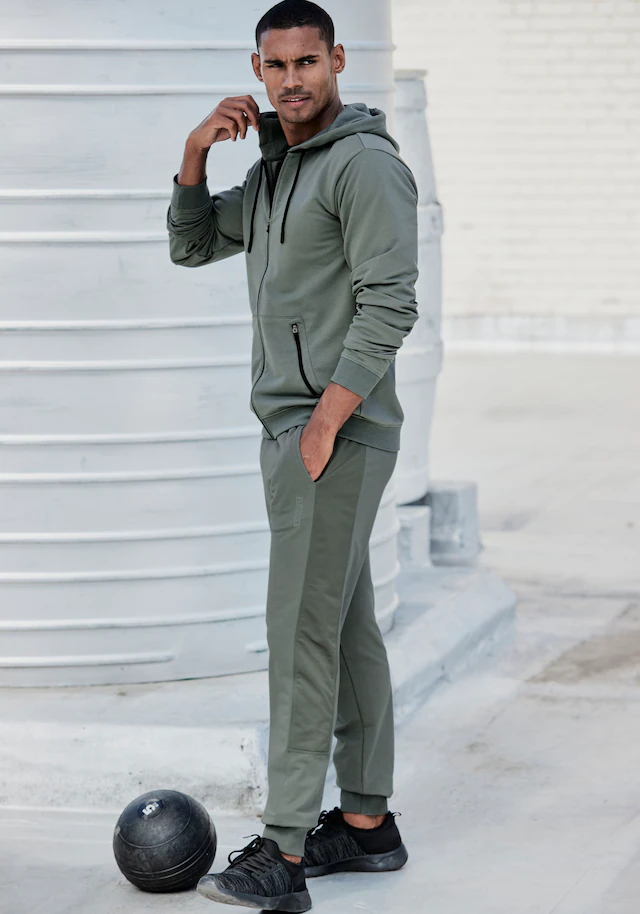 le jogger® Sweatpants mit farblichen Einsatz und Reißverschlusstaschen