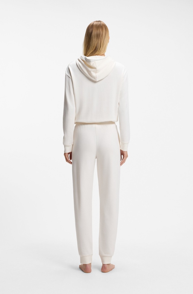 BOSS Relaxhose »CP Stripe_Pants Cuff« mit kontrastfarbener Kordel