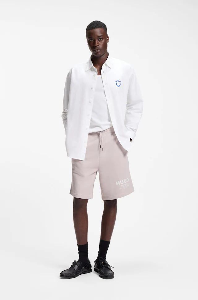 HUGO Sweatshorts »Nomario« mit großem Druck