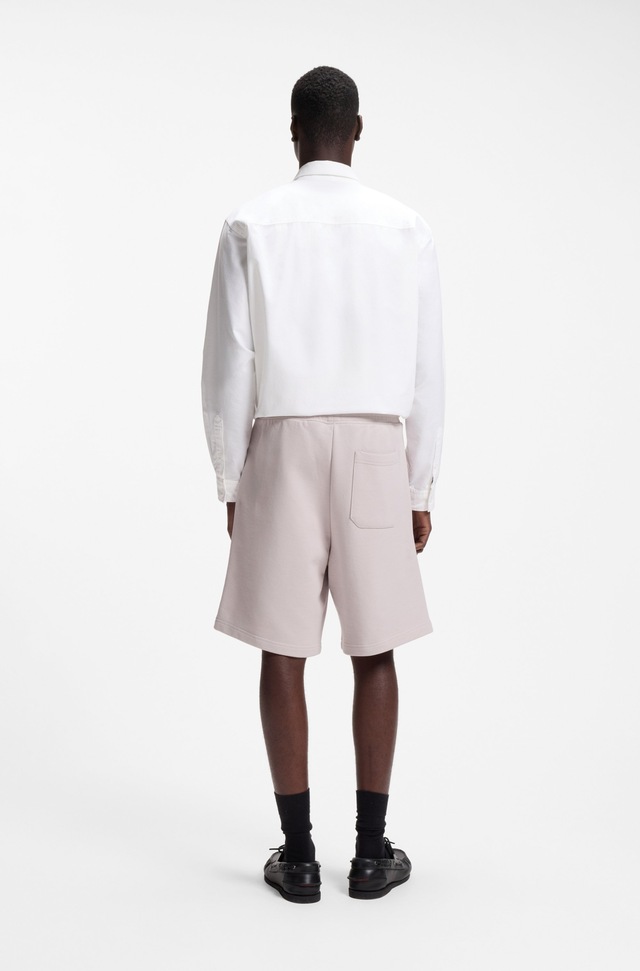 HUGO Sweatshorts »Nomario« mit großem Druck