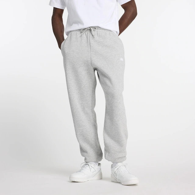 New Balance Jogginghose »SPORT ESSENTIALS FLEECE JOGGER« mit Eingrifftaschen, aus Fleece, lockere Passform