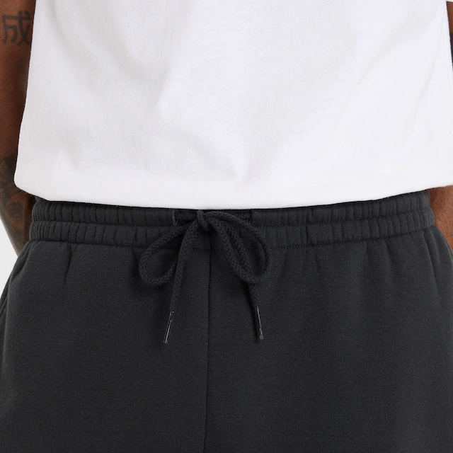 New Balance Jogginghose »SPORT ESSENTIALS FLEECE JOGGER« mit Eingrifftaschen, aus Fleece, lockere Passform