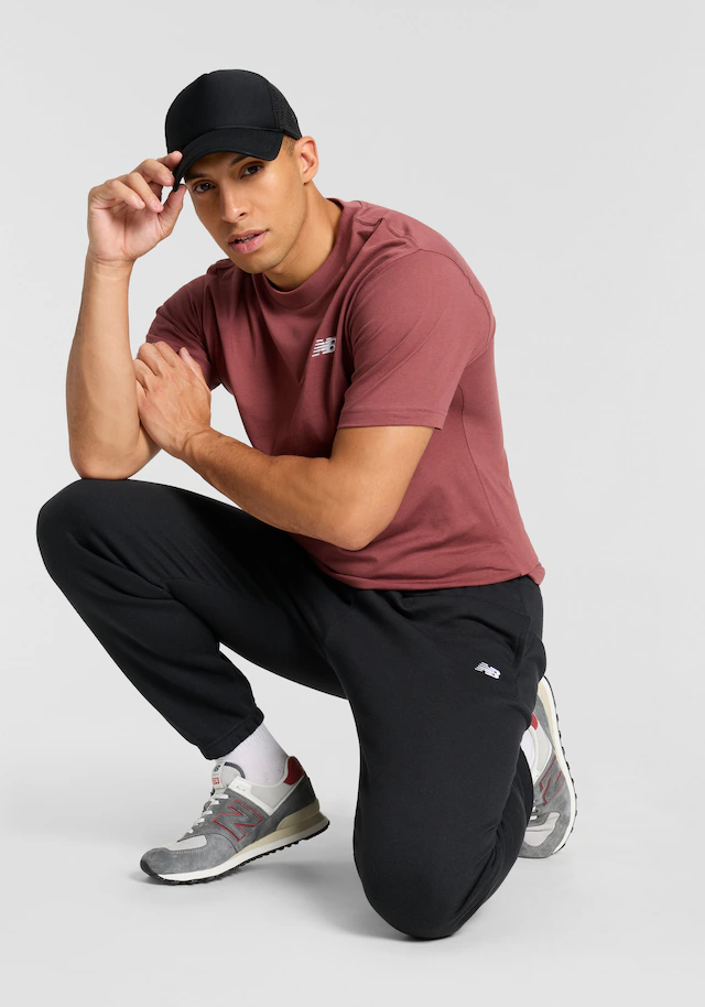 New Balance Jogginghose »SPORT ESSENTIALS FLEECE JOGGER« mit Eingrifftaschen, aus Fleece, lockere Passform