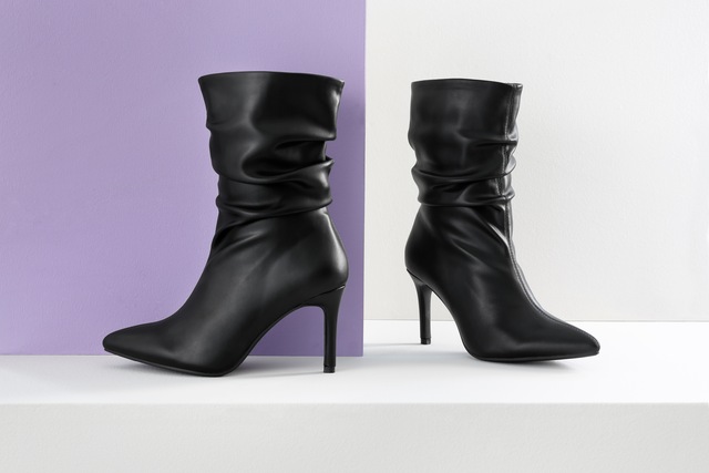 Aniston SHOES Stiefelette mit Raffungen am slouchy Schaft