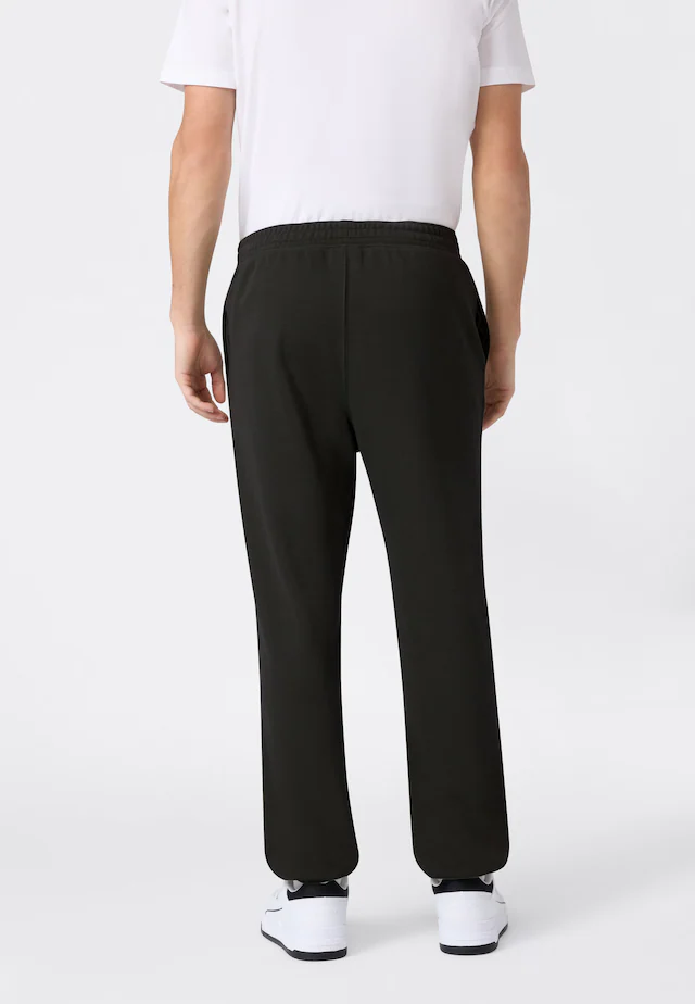 Champion Jogginghose »ICONS Terry Elastic Cuff Pants Large Logo« sportliche Jogginghose, aus Baumwolle und Polyester