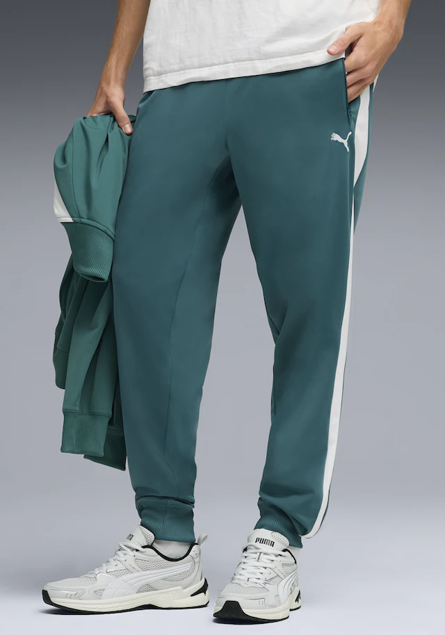 PUMA Trainingshose »T7 FOUNDATION CL POLY KNITTED PANTS« mit Eingrifftaschen, Regular Fit, sportlicher Stil