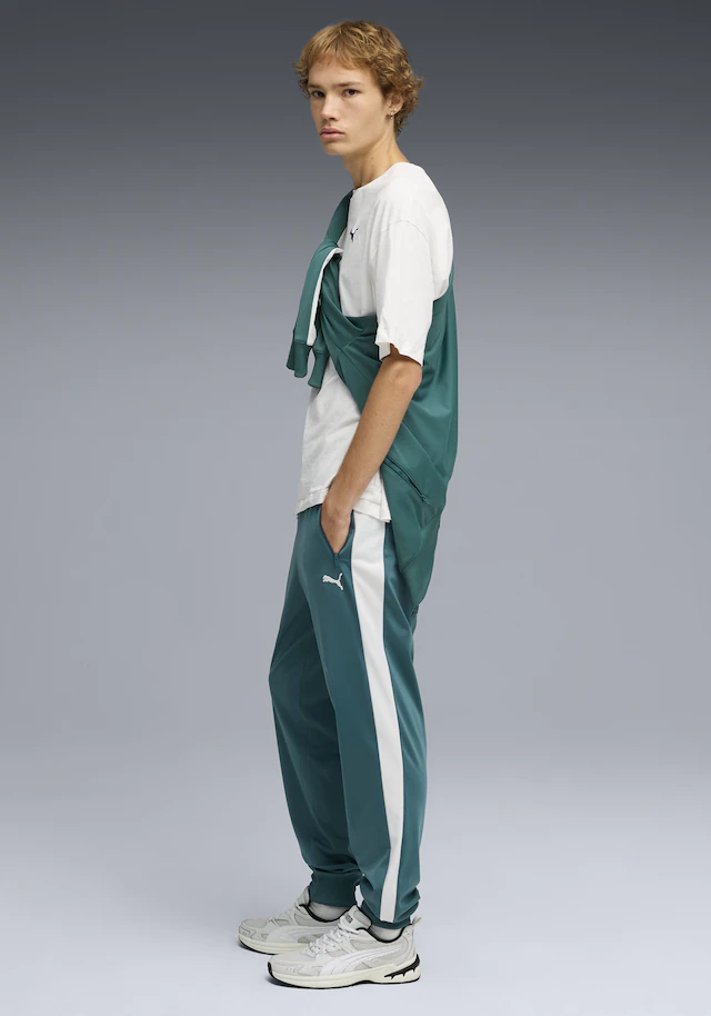 PUMA Trainingshose »T7 FOUNDATION CL POLY KNITTED PANTS« mit Eingrifftaschen, Regular Fit, sportlicher Stil