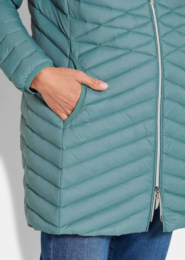 GOLDNER Winterjacke »Gefütterter langer Mantel mit Kapuze« mit femininer Steppung