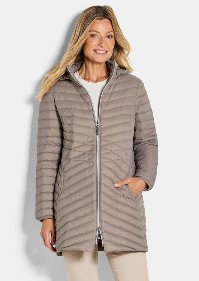 GOLDNER Winterjacke »Gefütterter langer Mantel mit Kapuze« mit femininer Steppung