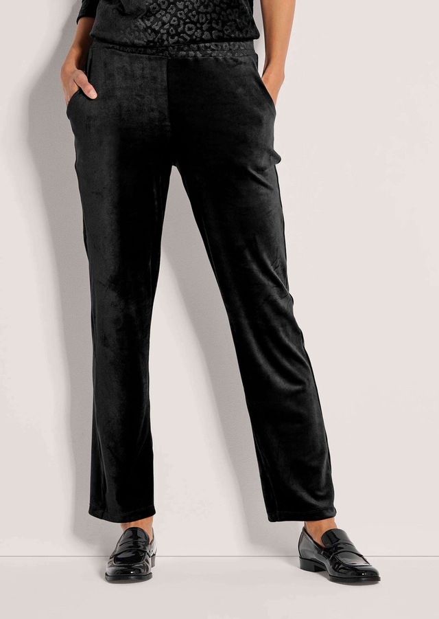 MADELEINE Schlupfhose »Sweathose Elegante Hose mit Leo-Print«