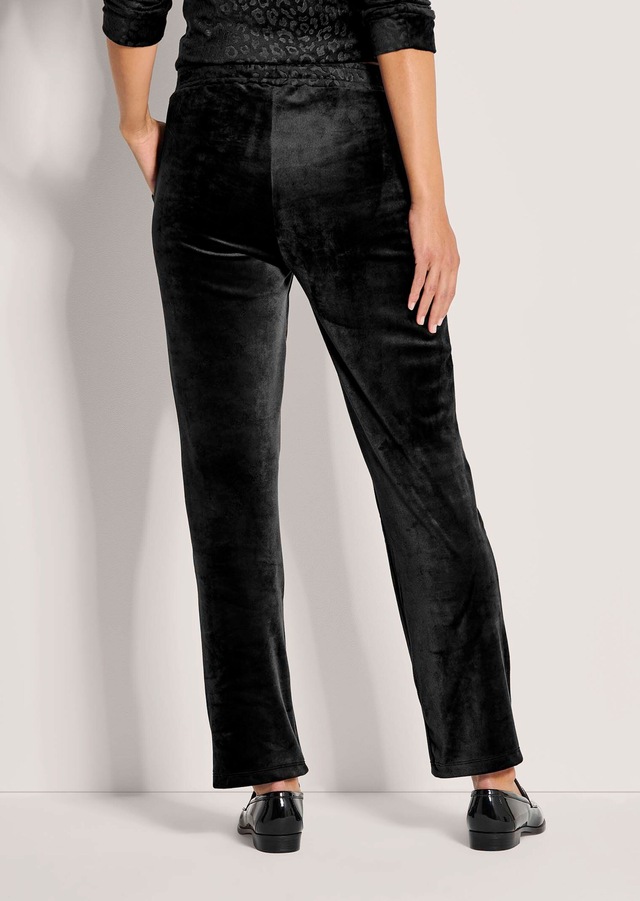 MADELEINE Schlupfhose »Sweathose Elegante Hose mit Leo-Print«