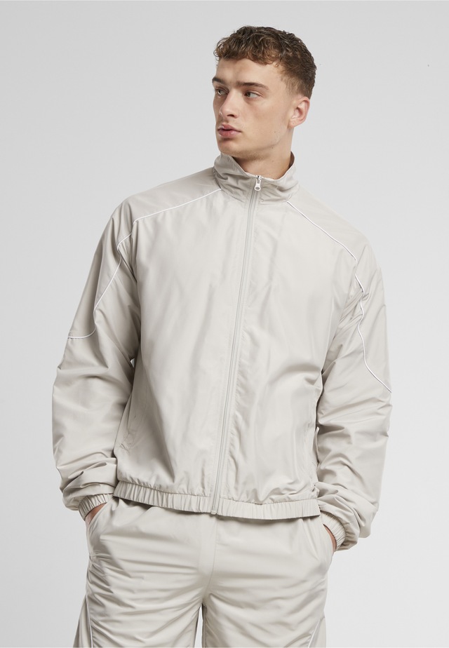 URBAN CLASSICS Trainingsjacke »Urban Classics Piped Panel Trackjacket« 1 Stk. tlg. ohne Kapuze