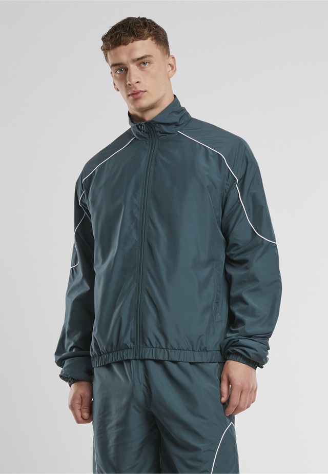 URBAN CLASSICS Trainingsjacke »Urban Classics Piped Panel Trackjacket« 1 Stk. tlg. ohne Kapuze