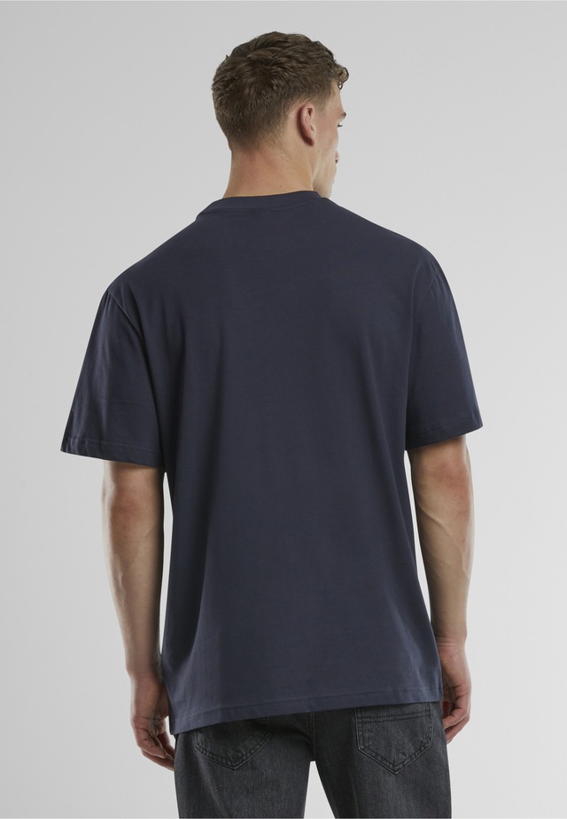 URBAN CLASSICS T-Shirt »Urban Classics UC College Logo Tall Tee« 1 Stk.