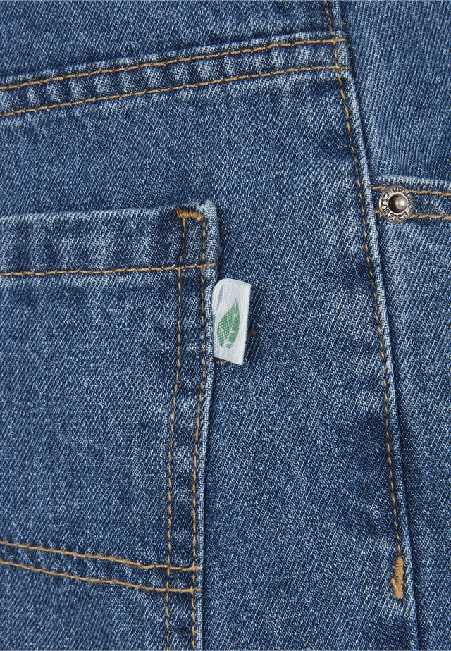 URBAN CLASSICS Bequeme Jeans »Urban Classics Herren Organic Triangle Denim« 1 Stk.