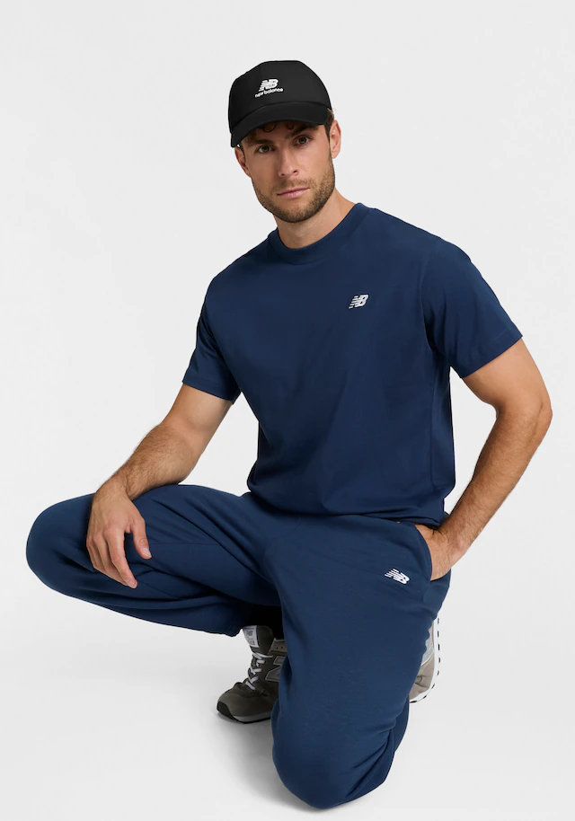 New Balance Jogginghose »SPORT ESSENTIALS FLEECE JOGGER« mit Eingrifftaschen, aus Fleece, lockere Passform