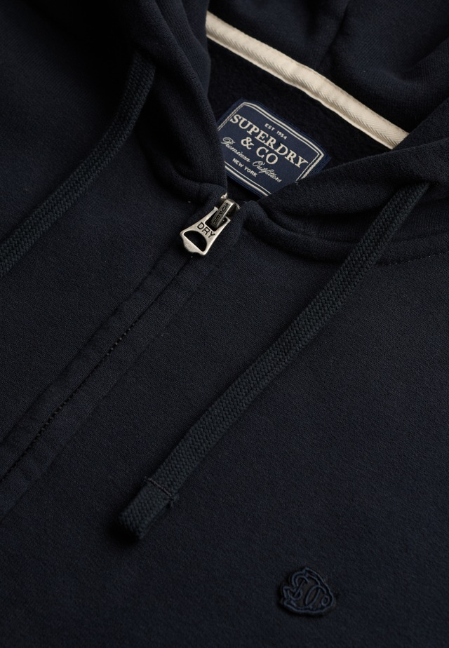 Superdry Kapuzensweatjacke »ESSENTIAL SDCO LOGO ZIPHOOD« Baumwollmischung, regular fit