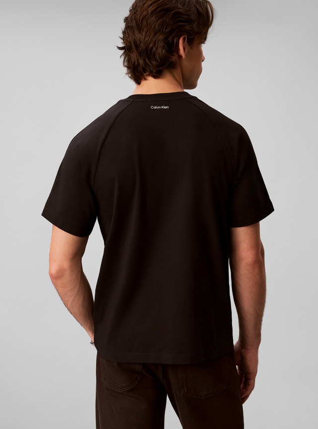 Calvin Klein Jeans T-Shirt »LOGO TAPE TEE« Regular fit, Logoschriftzug