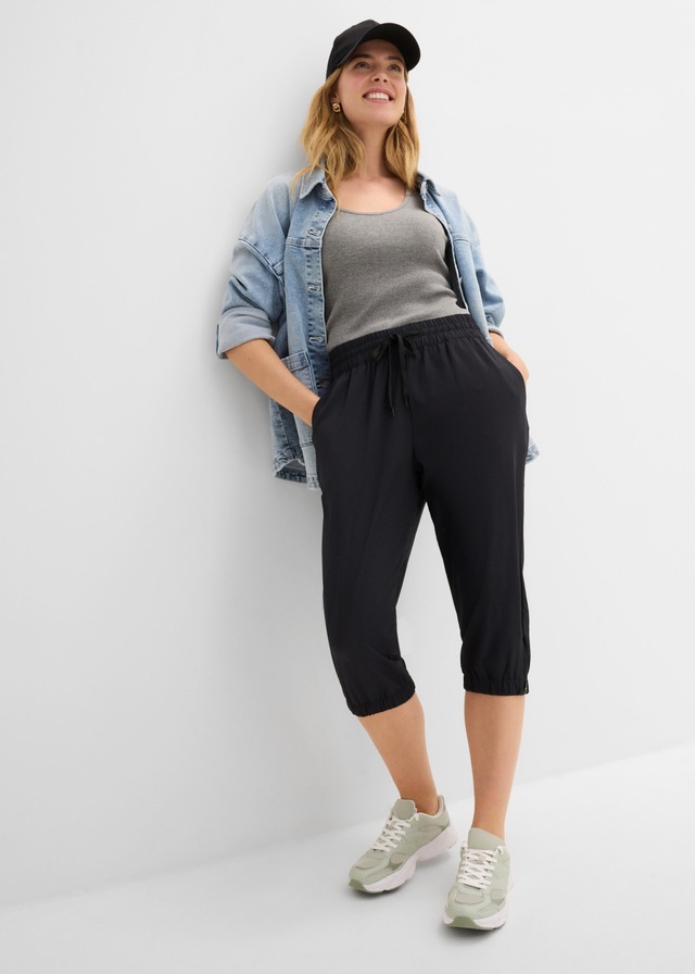 bonprix Funktionshose in 7/8 länge, Seitenschlitze mit Zipper, Reißverschlusstasche hinten