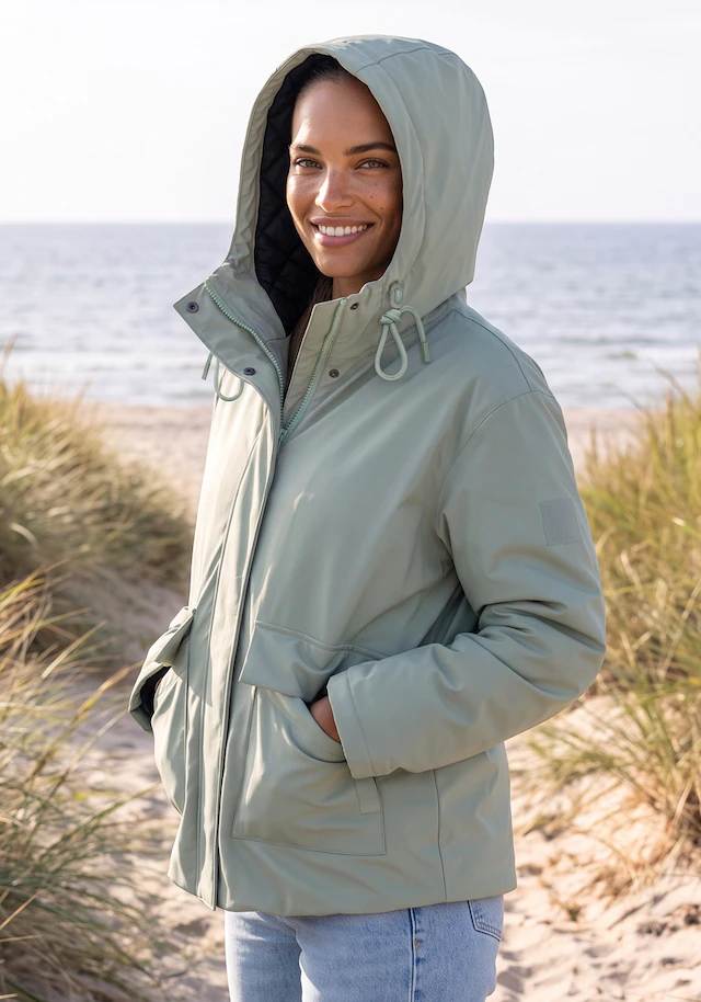 Elbsand Parka mit großem Logodruck auf der Rückseite