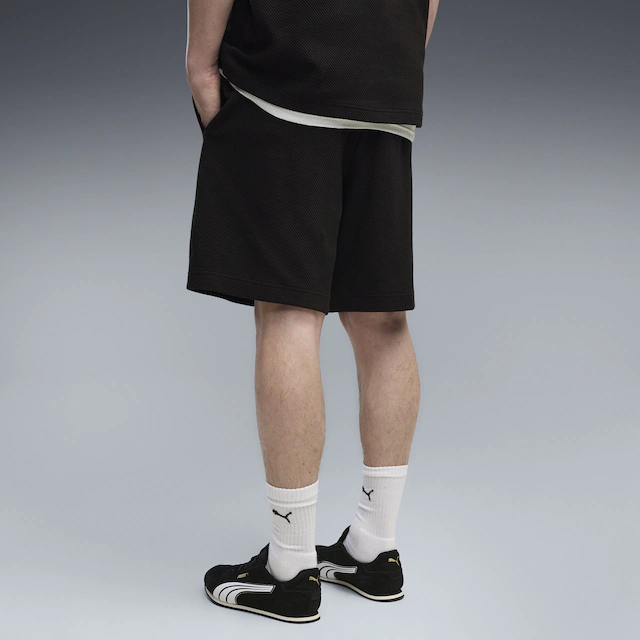 PUMA Sporthose »Essentials Elevated Relaxed Material Shorts Herren«
