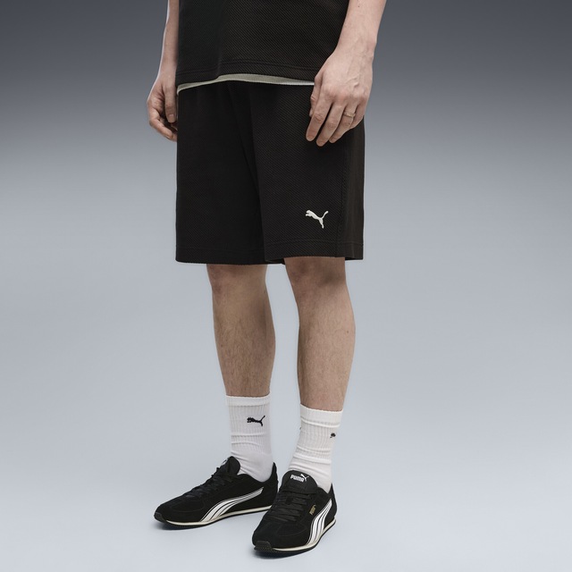 PUMA Sporthose »Essentials Elevated Relaxed Material Shorts Herren«