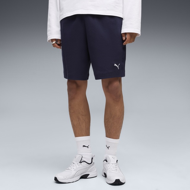 PUMA Sporthose »Essentials Elevated Relaxed Material Shorts Herren«