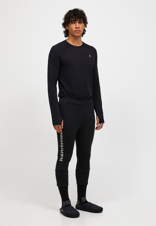 Peak Performance Leggings »M Rider Essentials Pants« mit Label-Applikationen