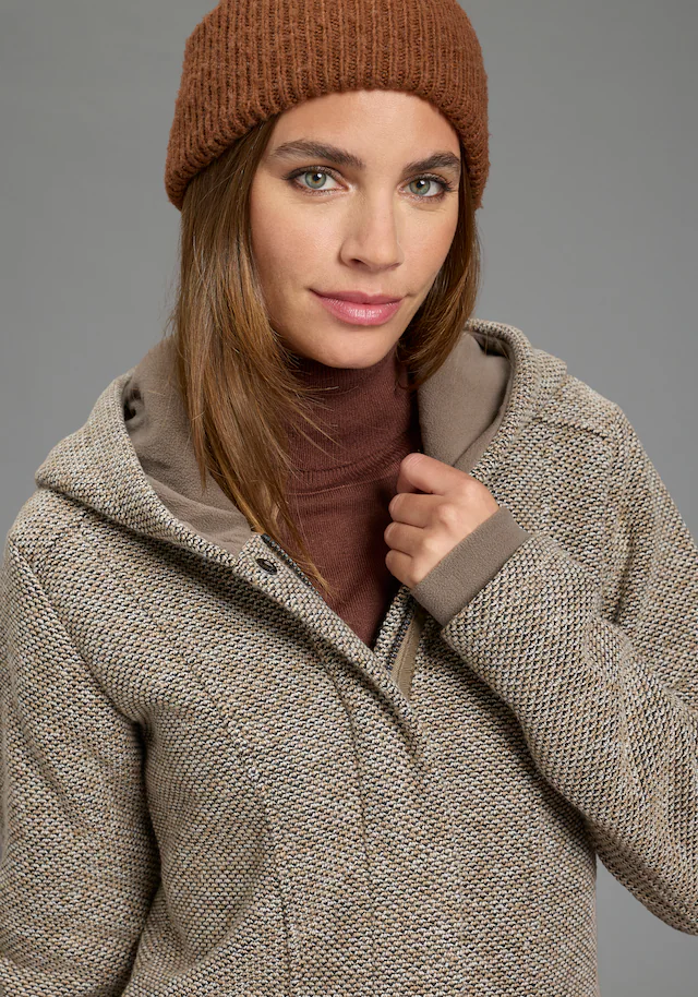 Polarino Strickmantel atmungsaktiv und wärmeisolierend. Strickoptik außen, Fleece innen.